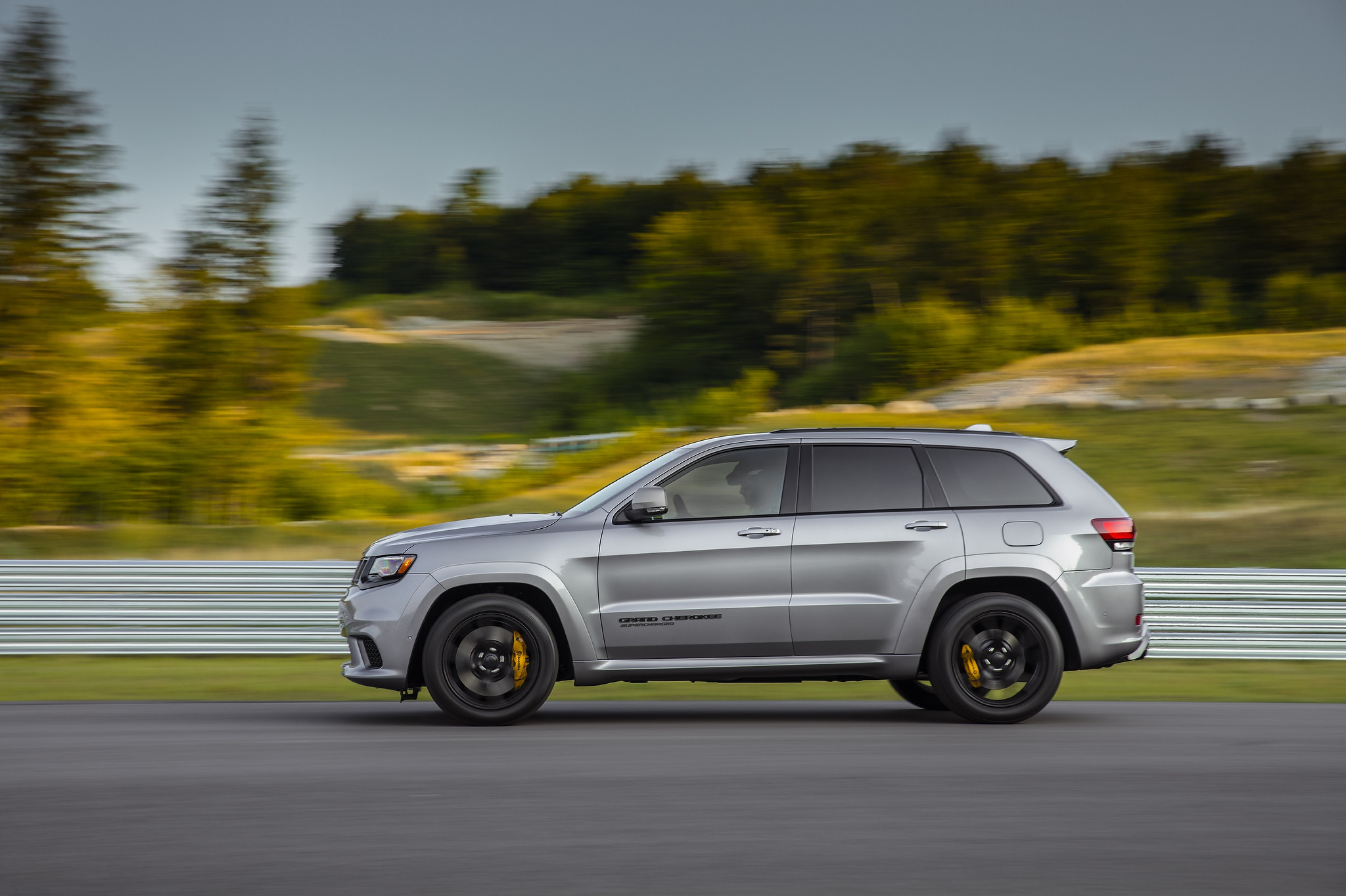 A 2021 Jeep Grand Cherokee Trackhawk driving