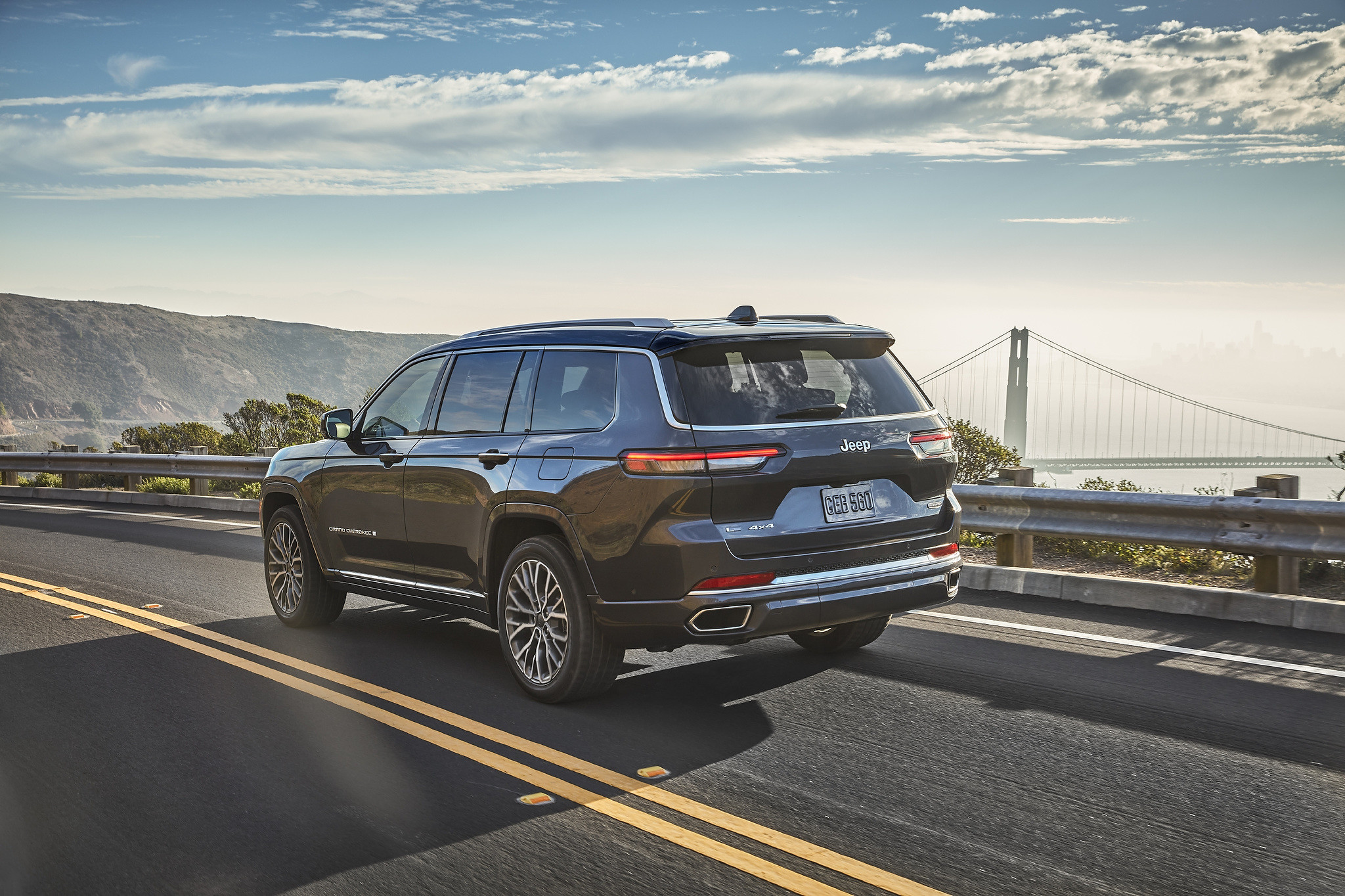A 2021 Jeep Grand Cherokee L driving on the road