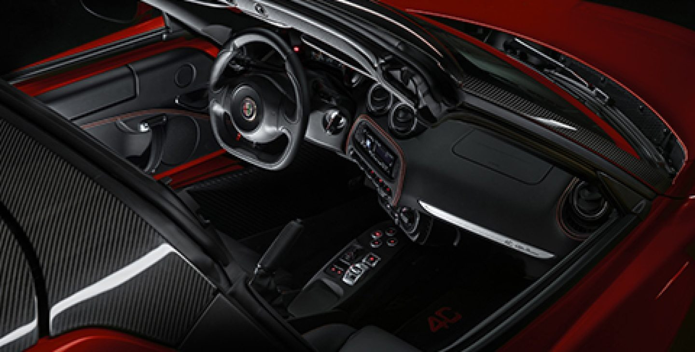 Une vue en plongée de l’Alfa Romeo 4C Spider 2020, la capote baissée, garée près d’un immeuble commercial.