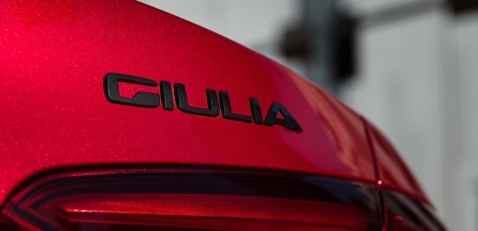 Close up view of the badge on the red 2019 Alfa Romeo Giulia