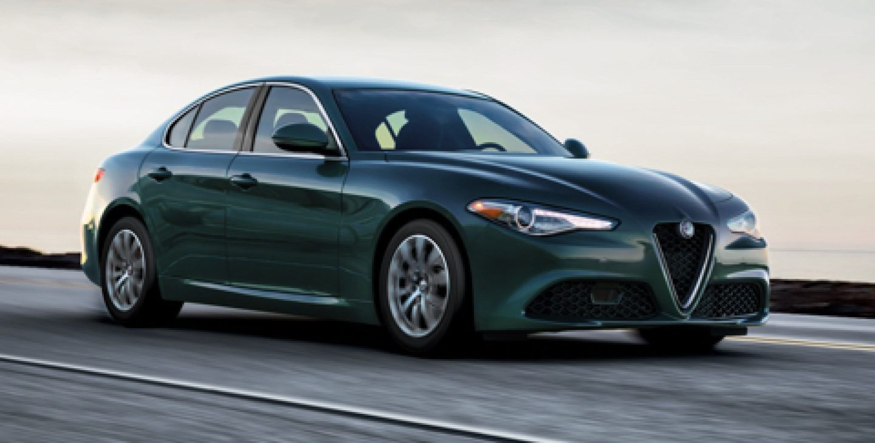 A 2020 Alfa Romeo Giulia being driven on an open road.