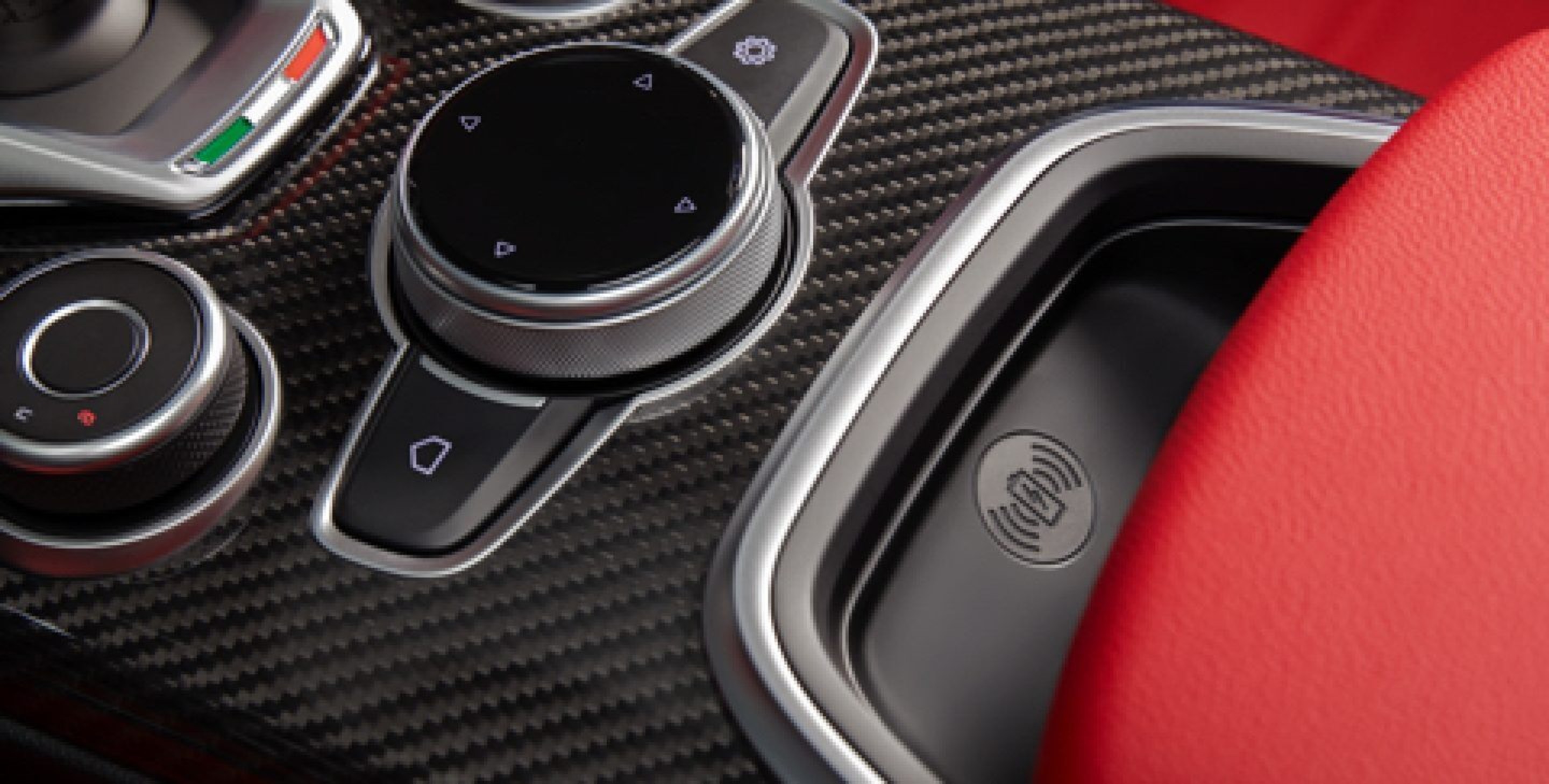 A close-up of the wireless charging pocket in the centre console of the 2020 Alfa Romeo Giulia.