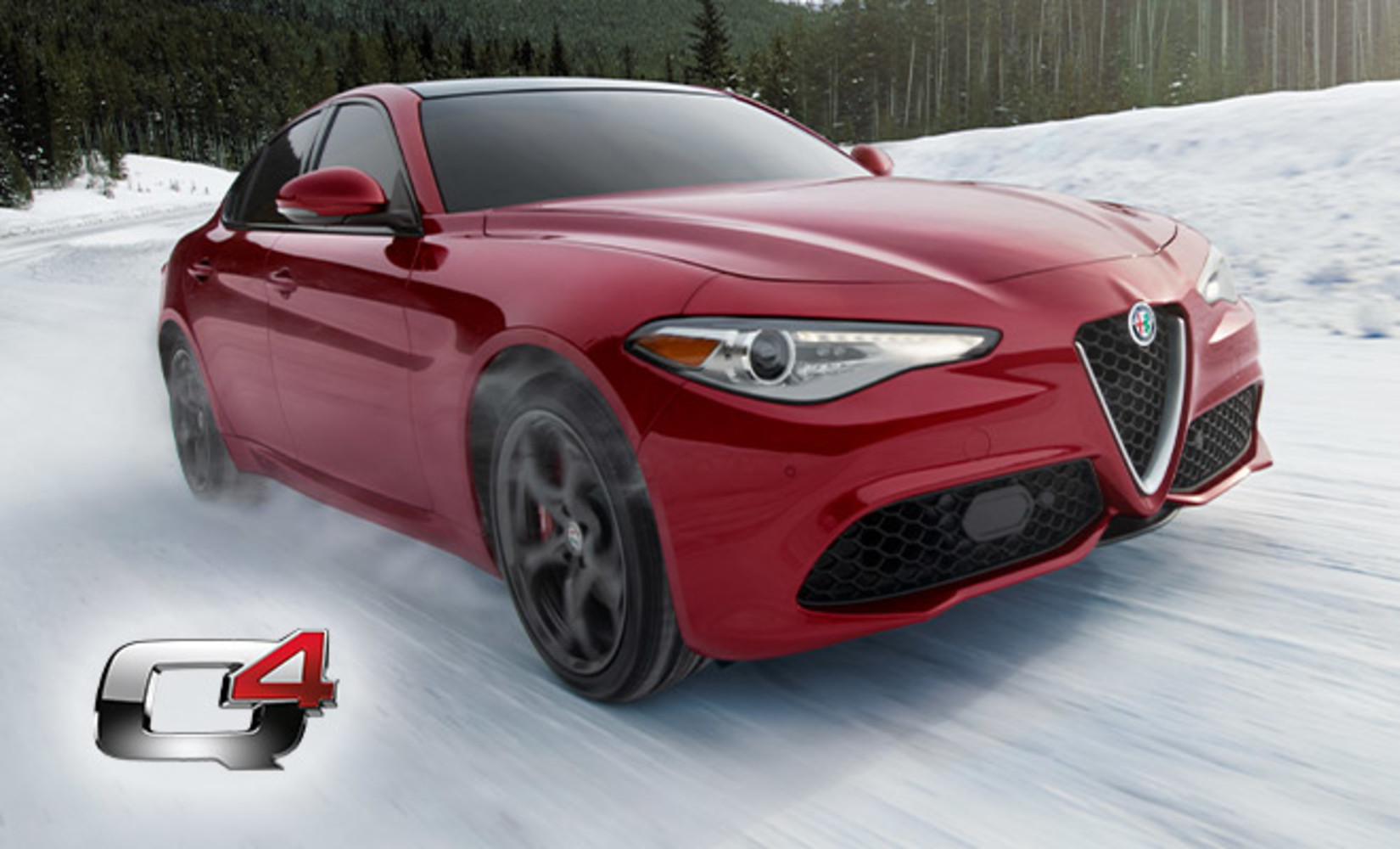 Three quarter front view of a red Alfa Romeo Giulia 2021, being driven on a snowy road in the mountains