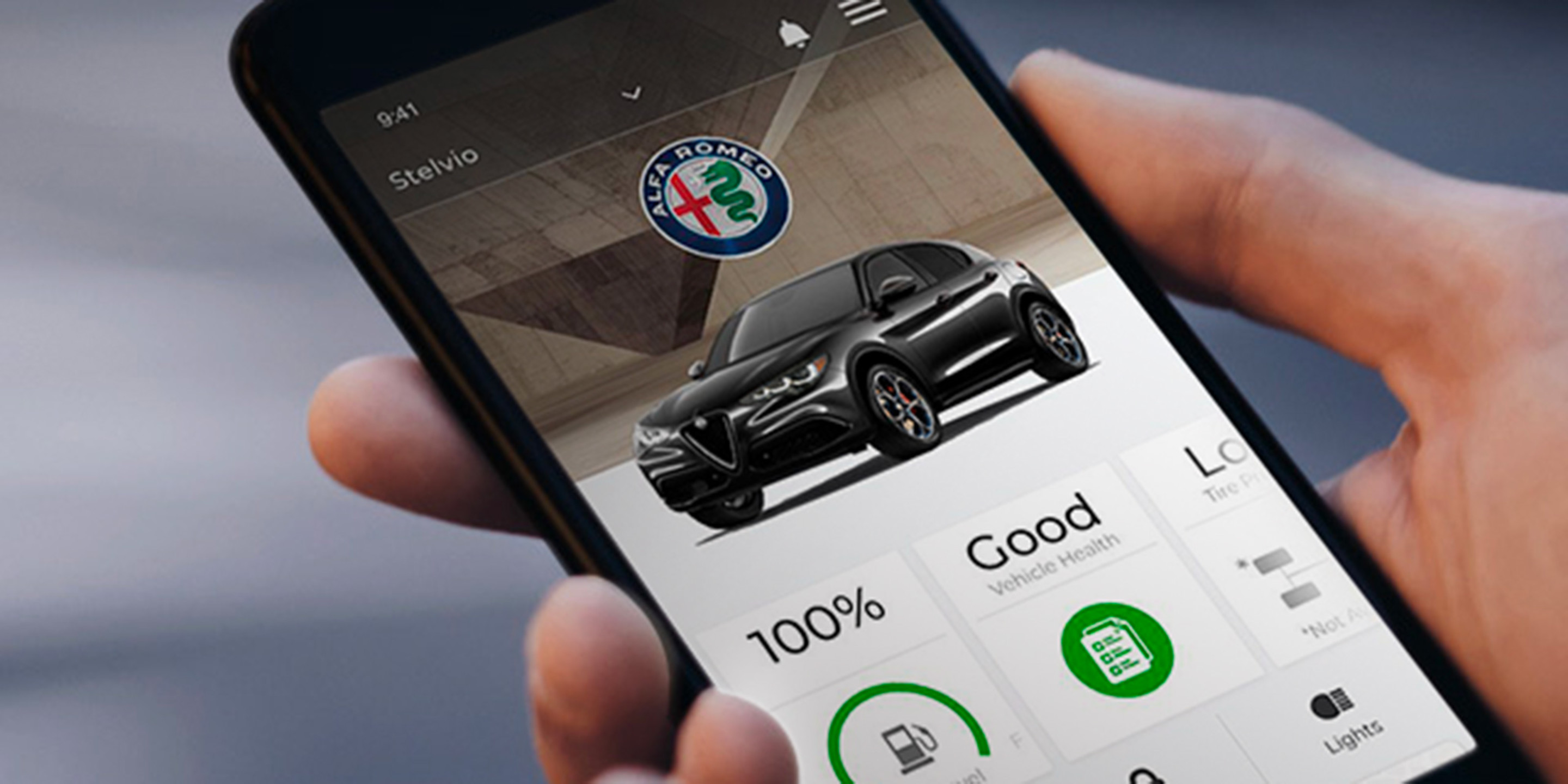 A close-up view of the Alfa App displayed on a smartphone, with the lock, unlock and fuel levels shown.