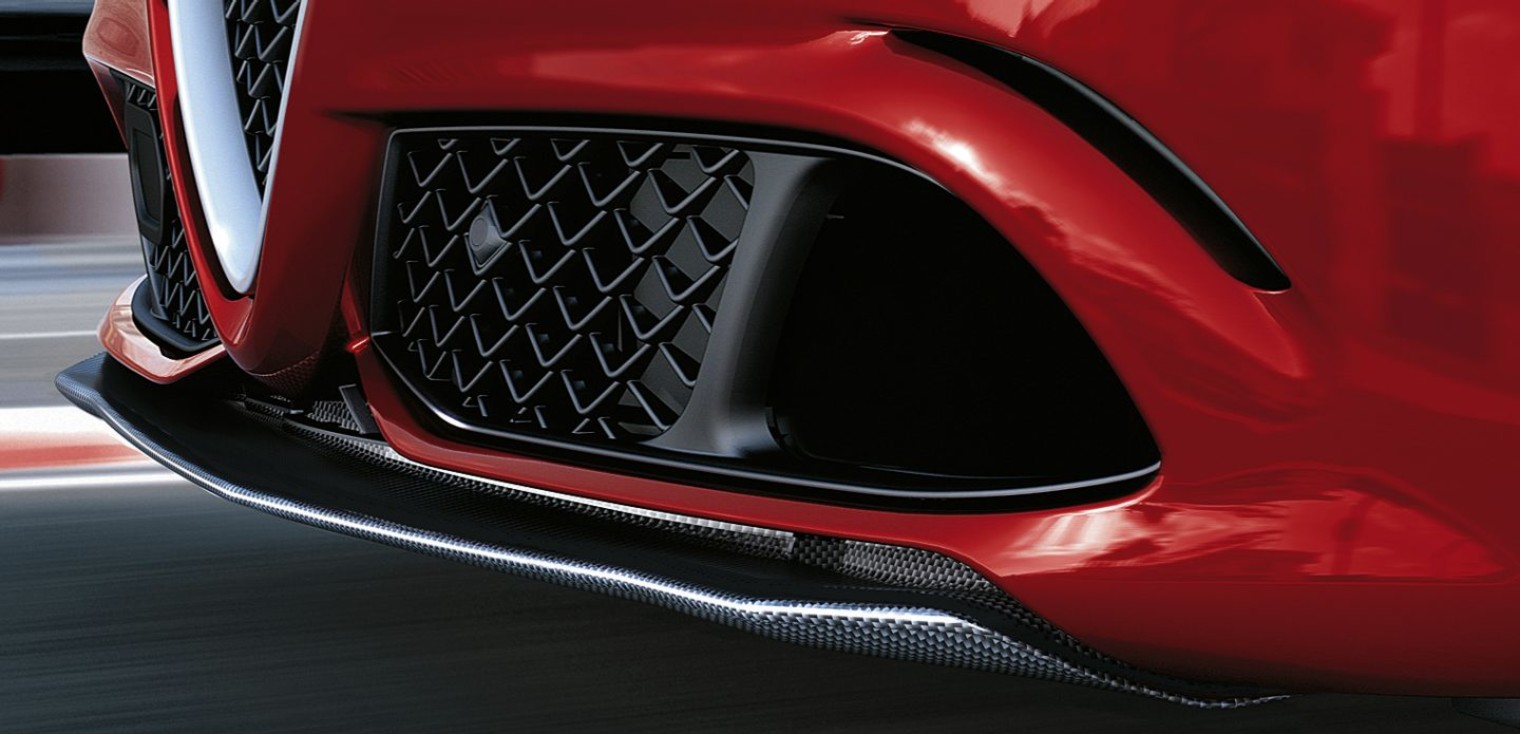 The Carbon Fibre Active Aero Front Splitter of the red 2019 Alfa Romeo Giulia Quadrifoglio