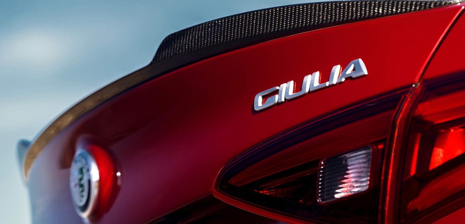 Close up view of the badge on the red 2019 Alfa Romeo Giulia Quadrifoglio