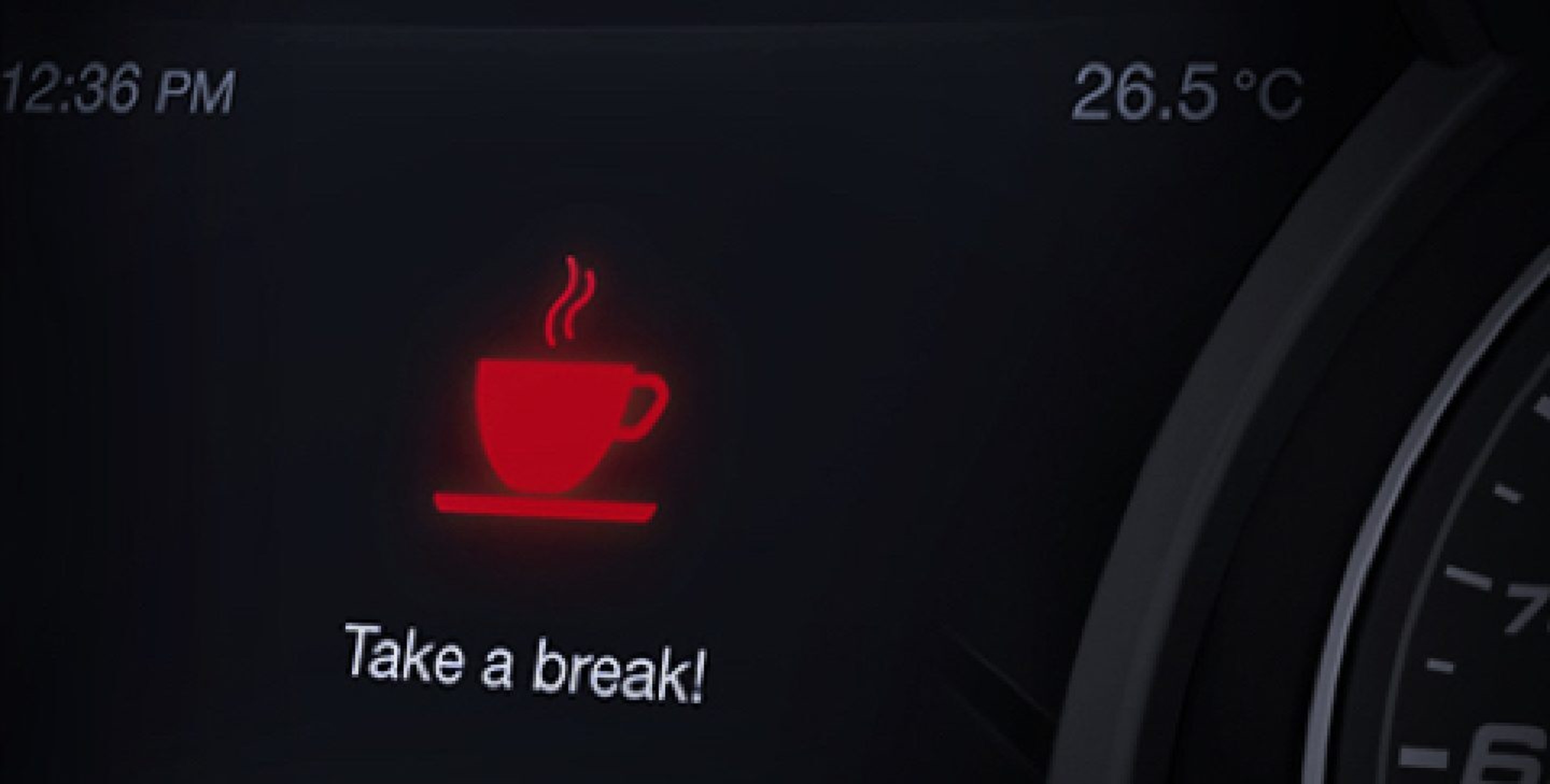 A close-up of the digital cluster display on the 2021 Alfa Romeo Giulia Quadrifoglio with a warning to the driver to take a break.