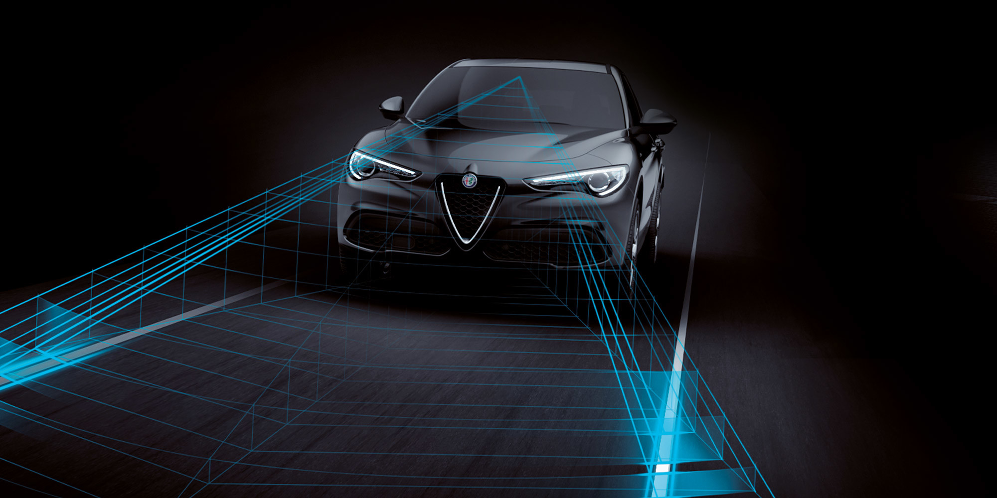A front view of a black Alfa Romeo Stelvio with illustrated blue sensor grid lines emanating from the front windshield.