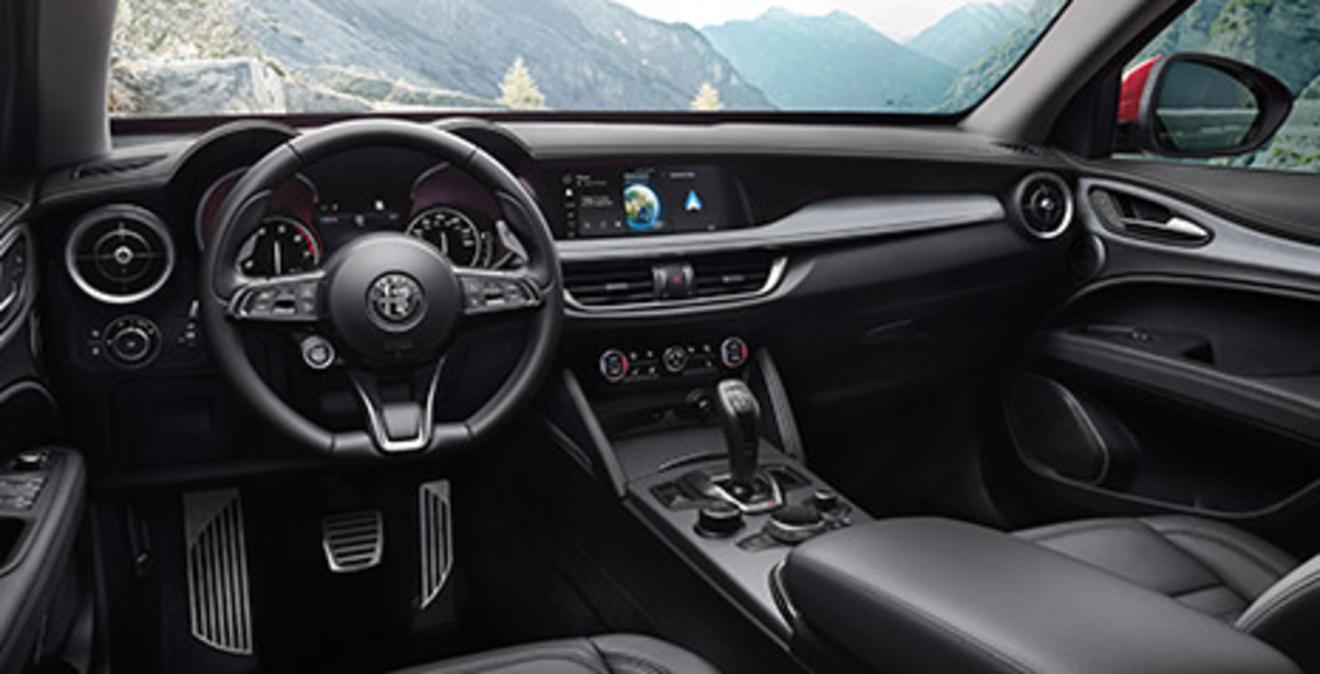 Interior view of the Alfa Romeo Stelvio, looking out to the mountains.