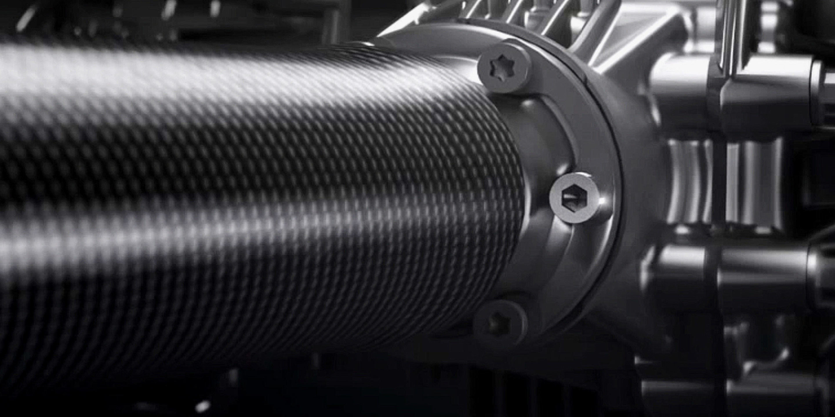Close up of the carbon fibre driveshaft in a black finish