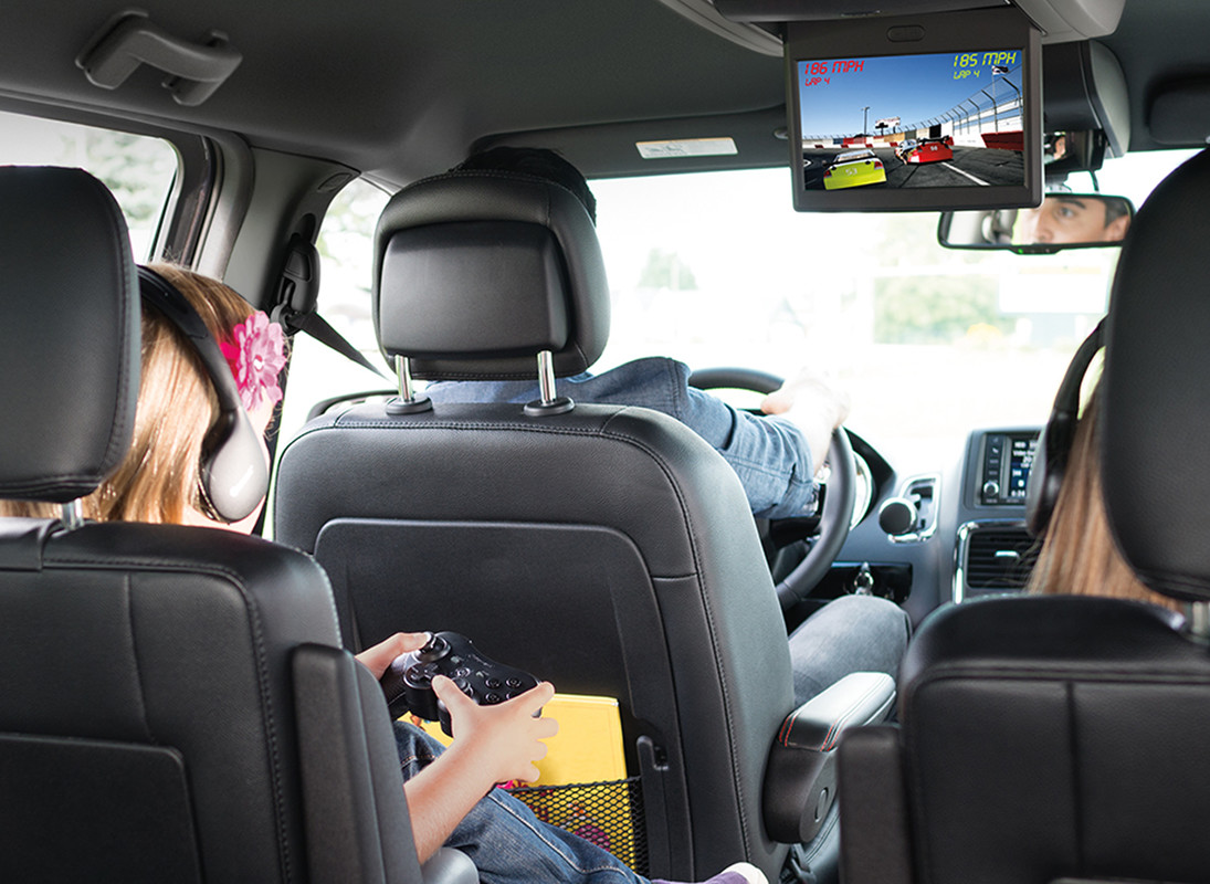 A family of five sitting in the 2020 Dodge Grand Caravan