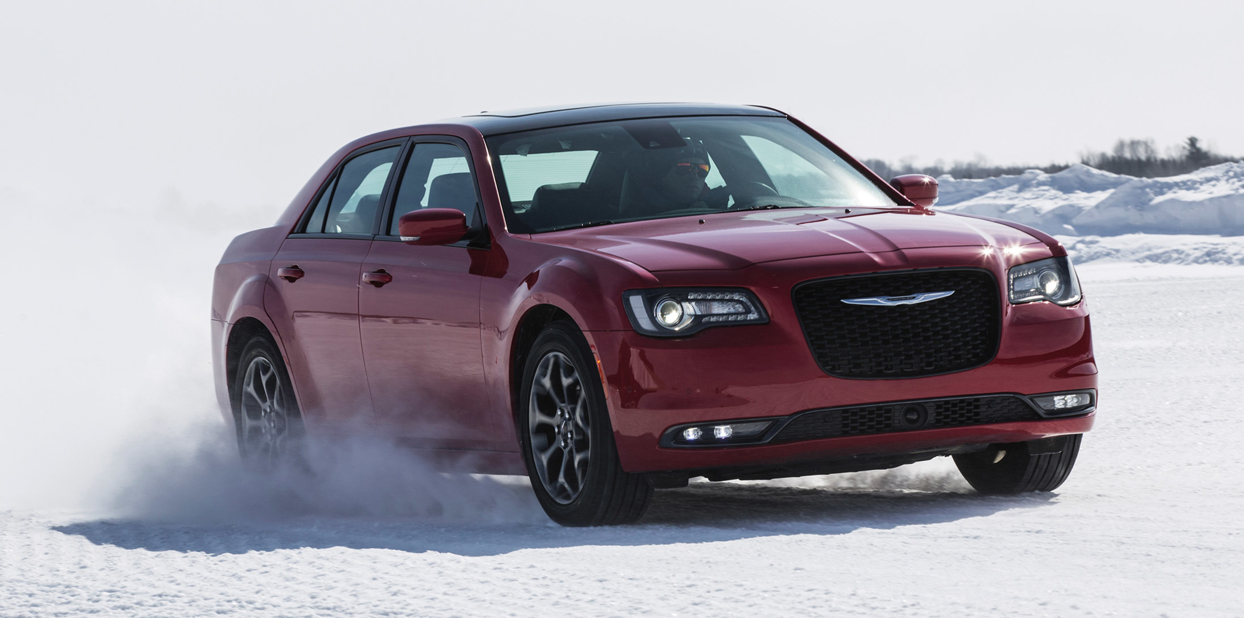 Red 2020 Chrysler 300 being driven through snow