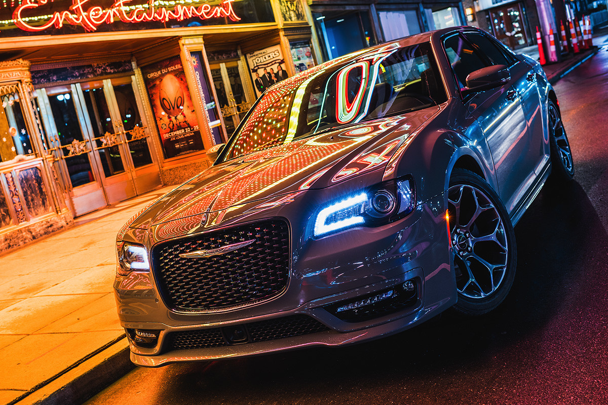 Front quarter view of the Chrysler 300S parked in front of building at night
