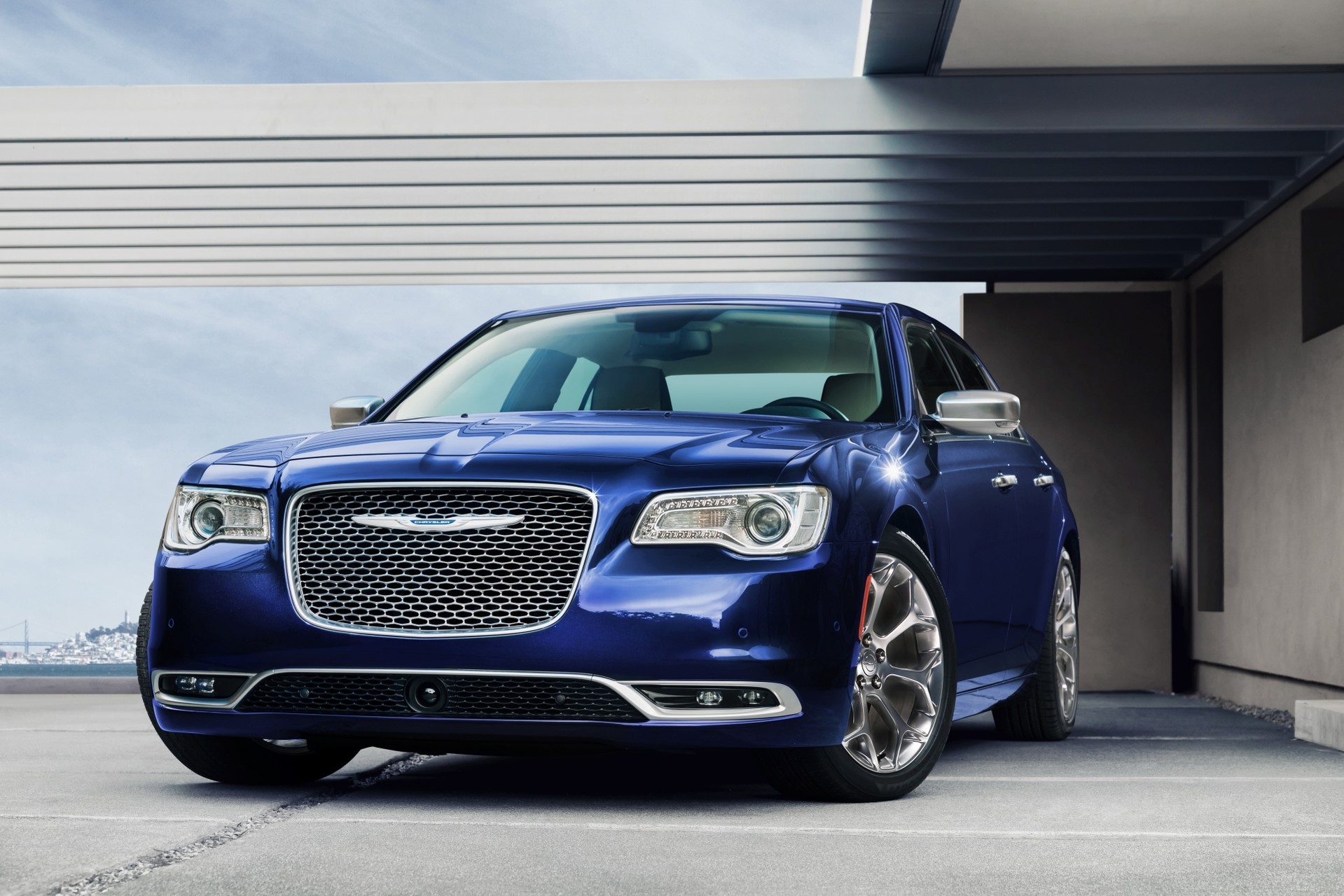 Front view of the blue 2020 Chrysler 300 parked on a driveway