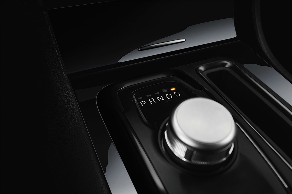 A close-up view of the Rotary E-shift dial in the 2021 Chrysler 300 set to Sport mode.