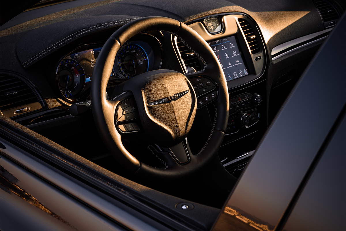 Photo of the steering wheel and interior dash of a Chrysler 300