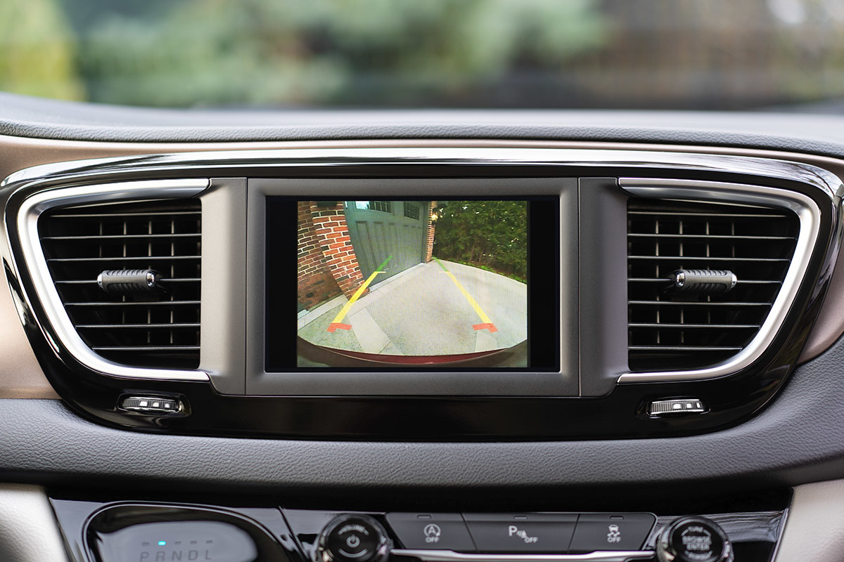 A close-up of the standard ParkView® Rear Back Up Camera inside the 2021 Chrysler Grand Caravan displaying view of what’s behind the vehicle.