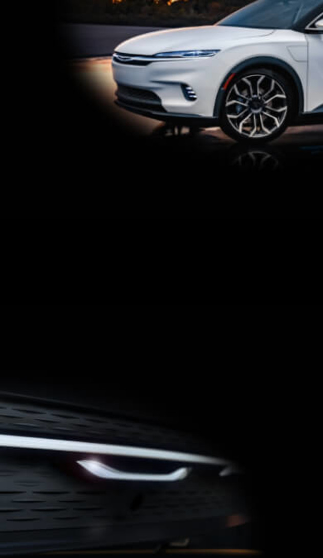 Vue de profil d'un véhicule Chrysler Airflow Concept stationné dans un environnement sombre.
