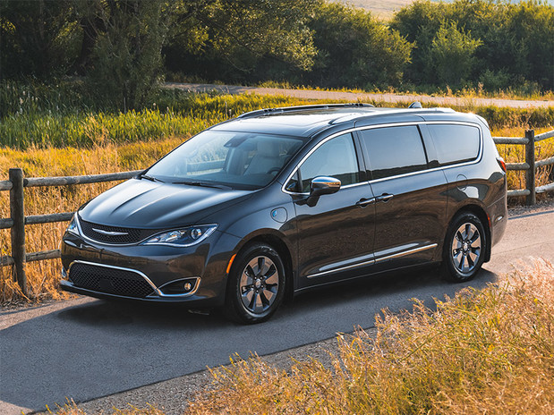 A black 2020 Chrysler Pacifica parked on a country road