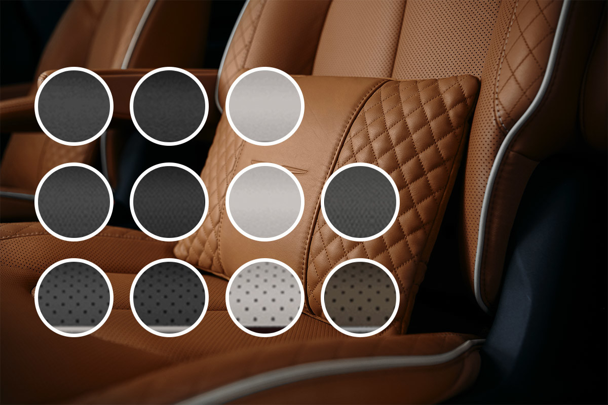 Sit Back in Comfort A close-up of the deep-quilted Caramel Nappa leather-faced seats and movable lumbar support pillows in the second row of the 2021 Chrysler Pacifica.