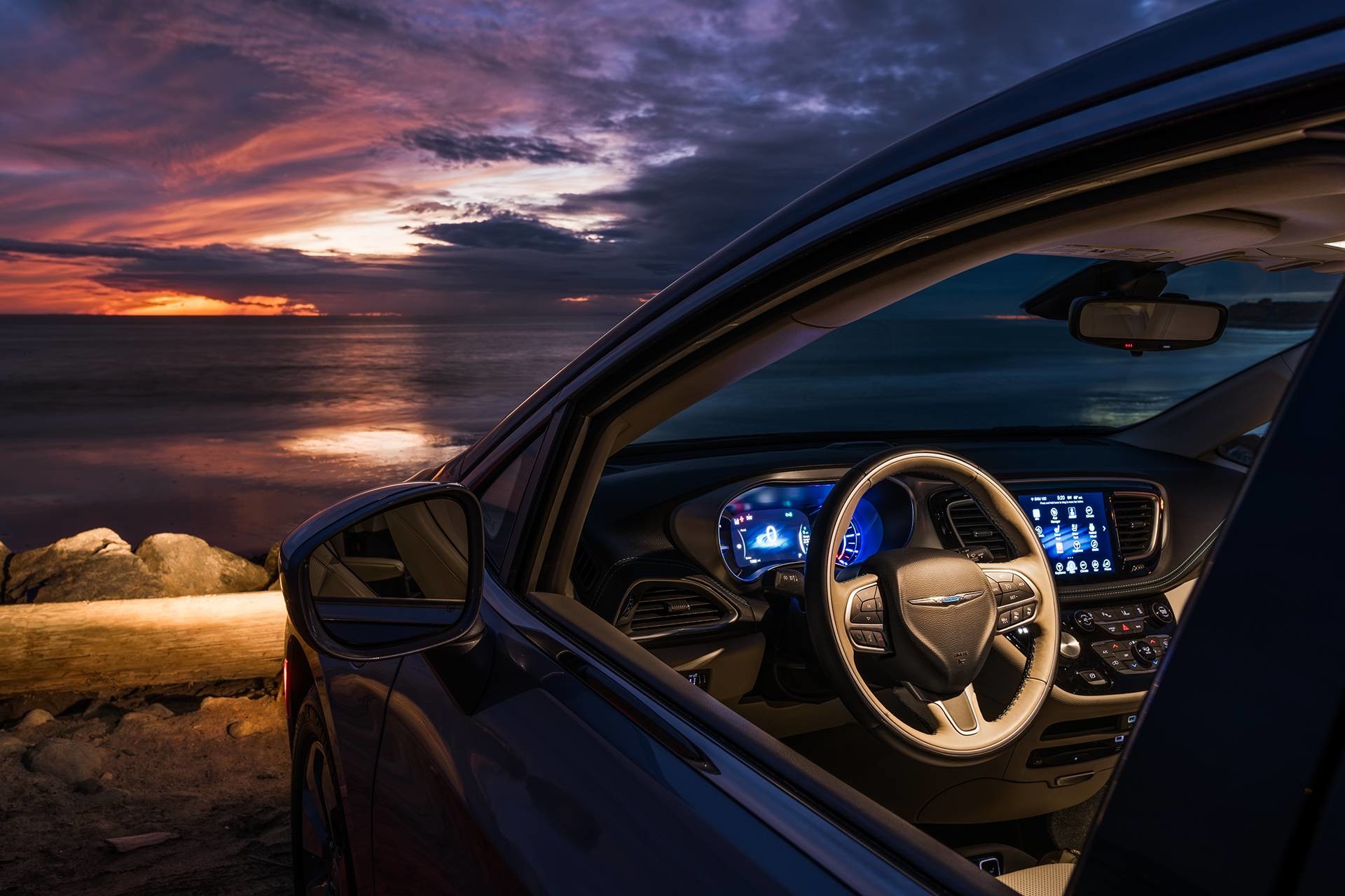 2019 Chrysler Pacifica Hybrid interior showing 7-inch full-colour in-cluster display and Uconnect NAV
