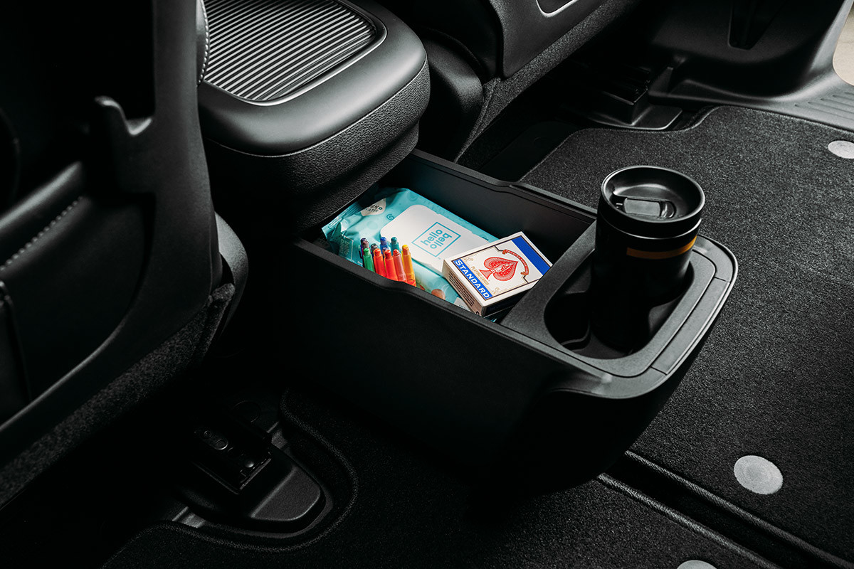 Cup holder in the backseat centre console of the 2021 Chrysler Pacifica Hybrid
