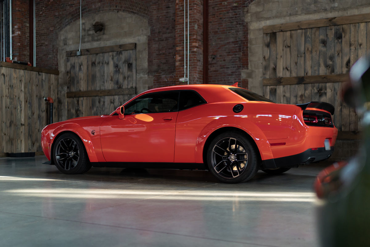 2019 Dodge Challenger driving down a hill