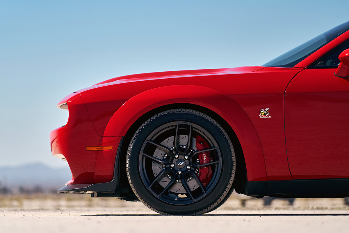 2019 Dodge Challenger close up of sideview, shown in red