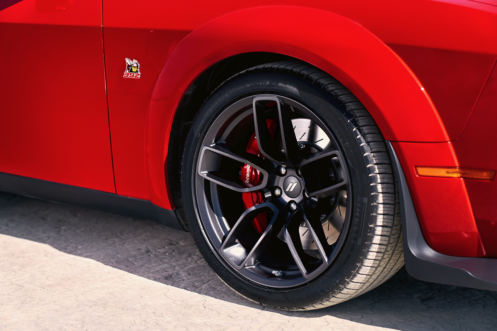 2019 Dodge Challenger in red showing 20-inch aluminum wheels