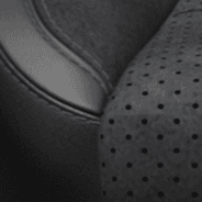 Nappa leather-faced with <span class="unbr">Alcantara<sup>®</sup></span> suede bolsters and perforated inserts – Black with Tungsten accent stitching