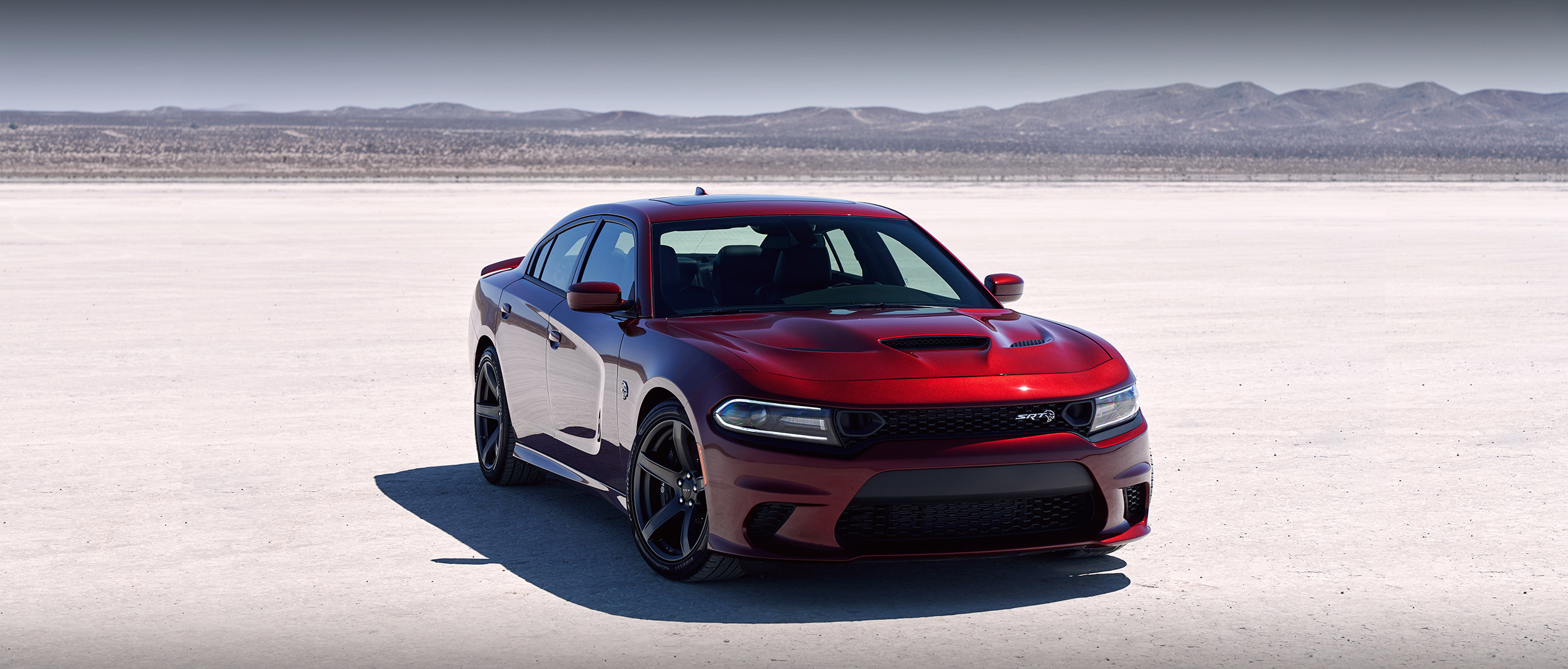 Red Dodge Charger Parked in the Middle of the Desert