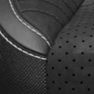 Laguna leather with <span class="unbr">Alcantara<sup>®</sup></span> suede bolsters and perforated inserts – Black with Silver accent stitching