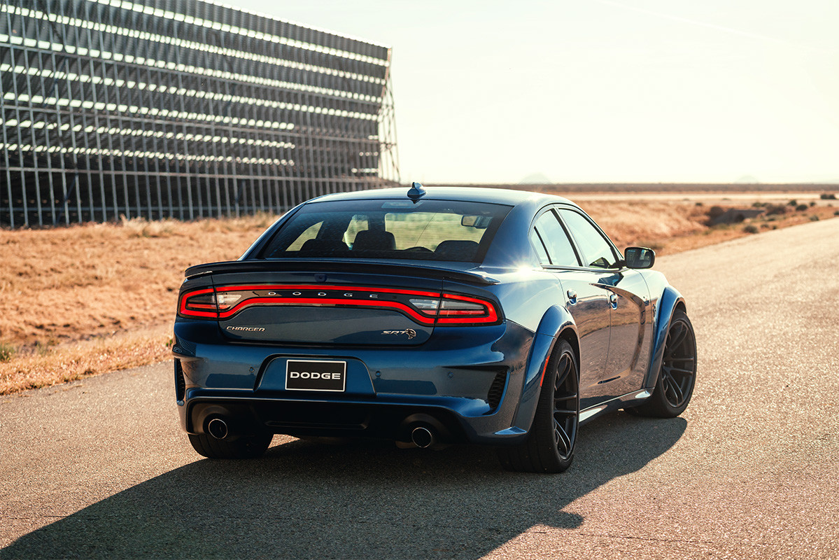 The blue 2020 Dodge Charger SRT® Hellcat parked on a road in a desert