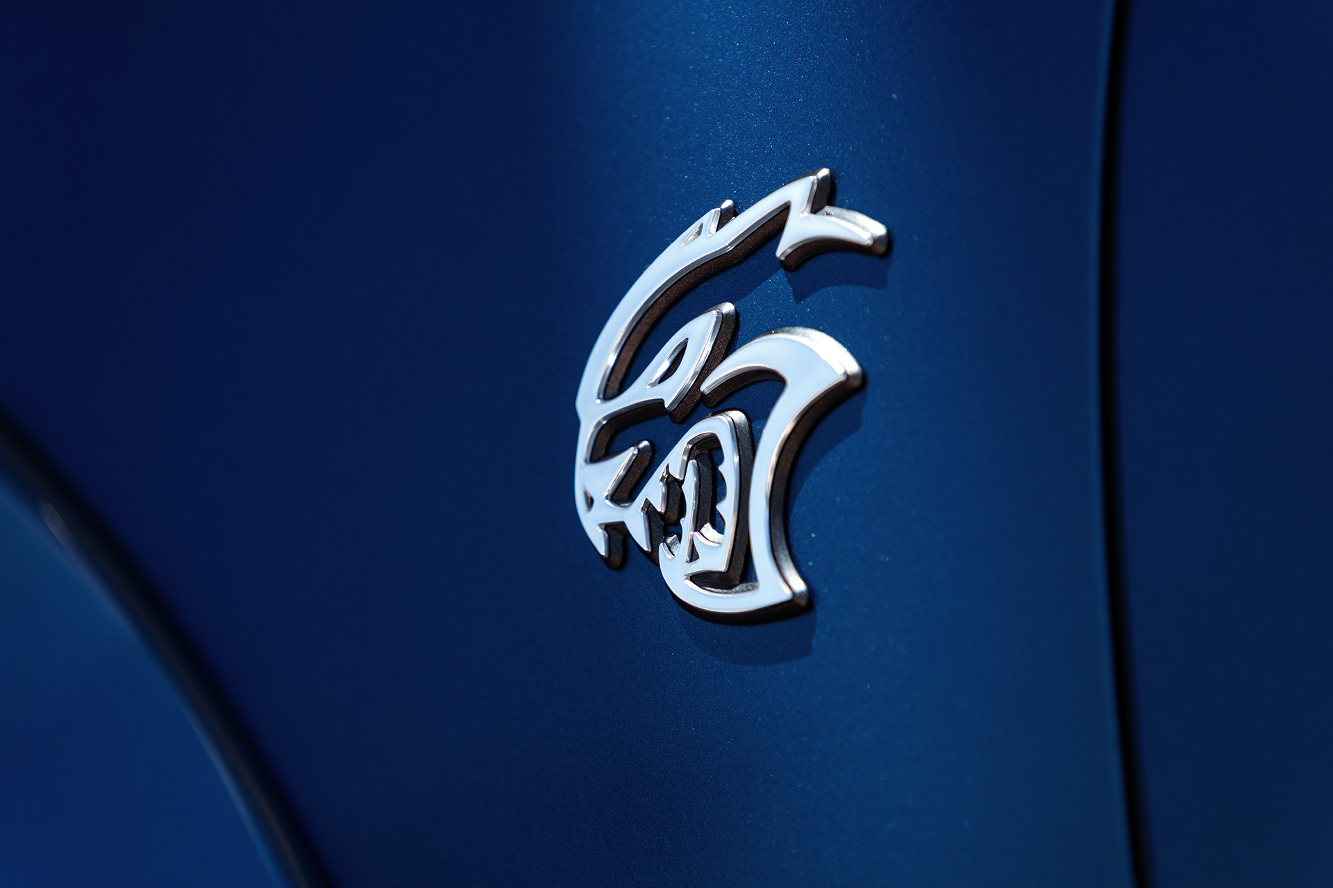 SRT® Hellcat badge of the blue 2020 Dodge Charger