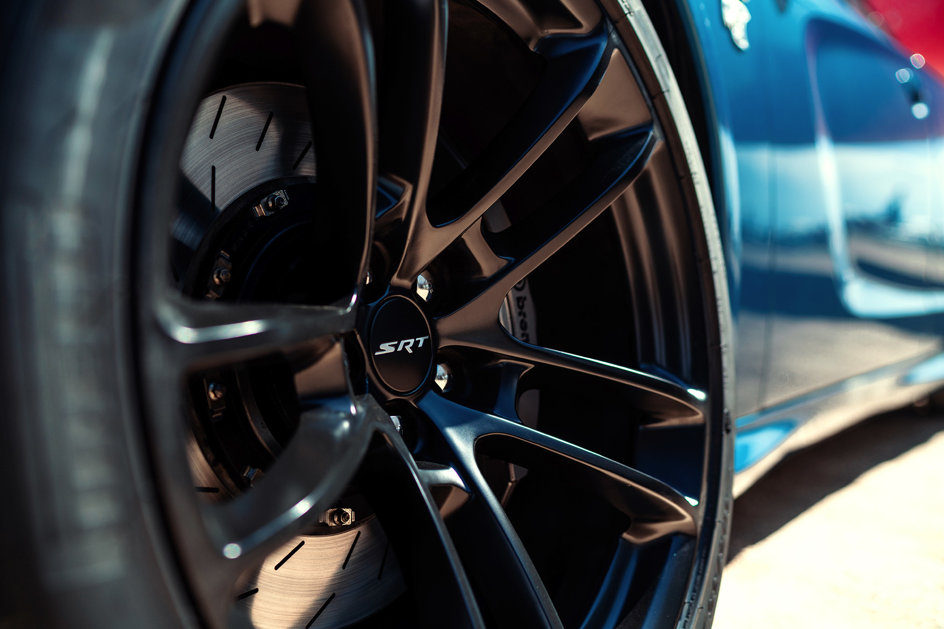 Close up view of black aluminum wheel of the 2020 Dodge Charger SRT® Hellcat