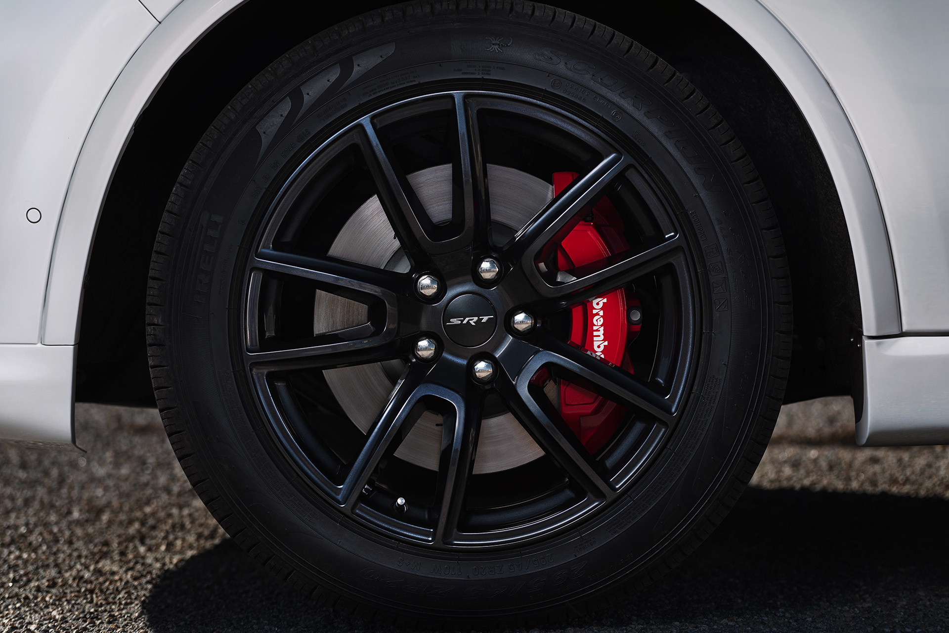 Zoomed in view of 20 inch matte vapor aluminum wheels of 2020 Dodge Durango with red brake caliper