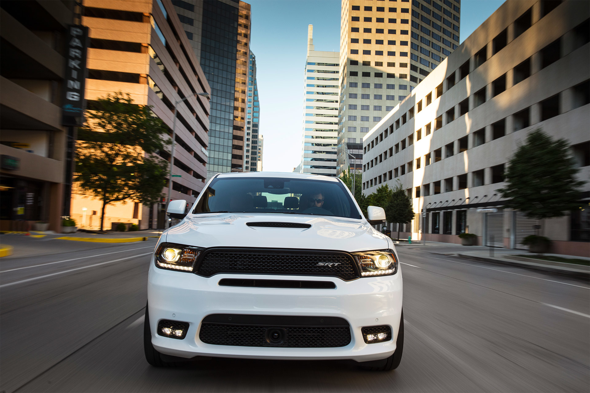 Front view of White 2020 Dodge Durango SRT being driven in a city