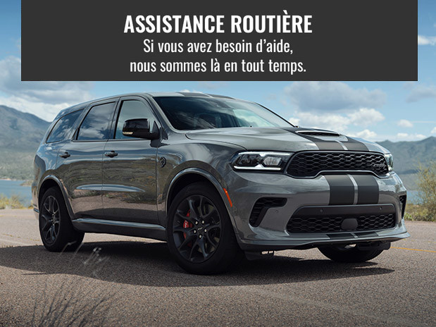 2021 Dodge Durango gris garé avec fond de montagne. Assistance routière. Si vous avez besoin d'aide, nous sommes là en tout temps.