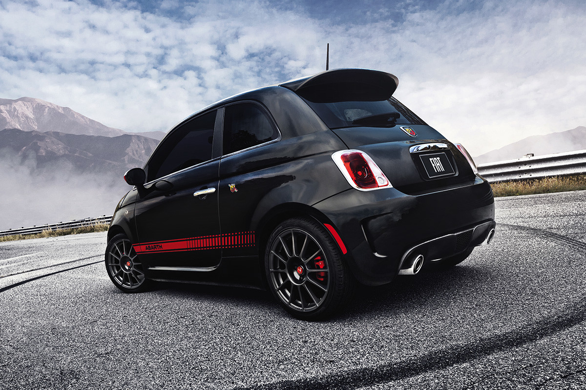 Black 2019 FIAT® 500 Abarth parked on a road.
