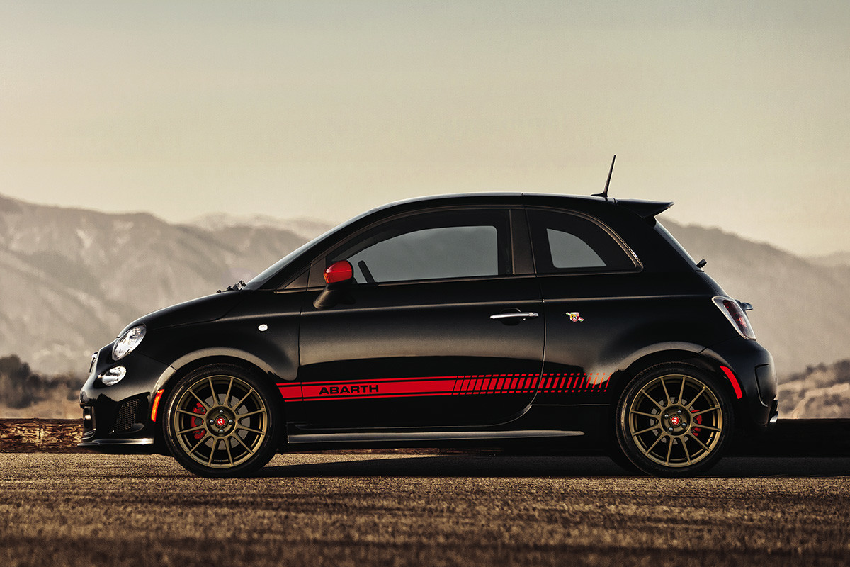 Black 2019 FIAT® 500 Abarth parked in the desert.