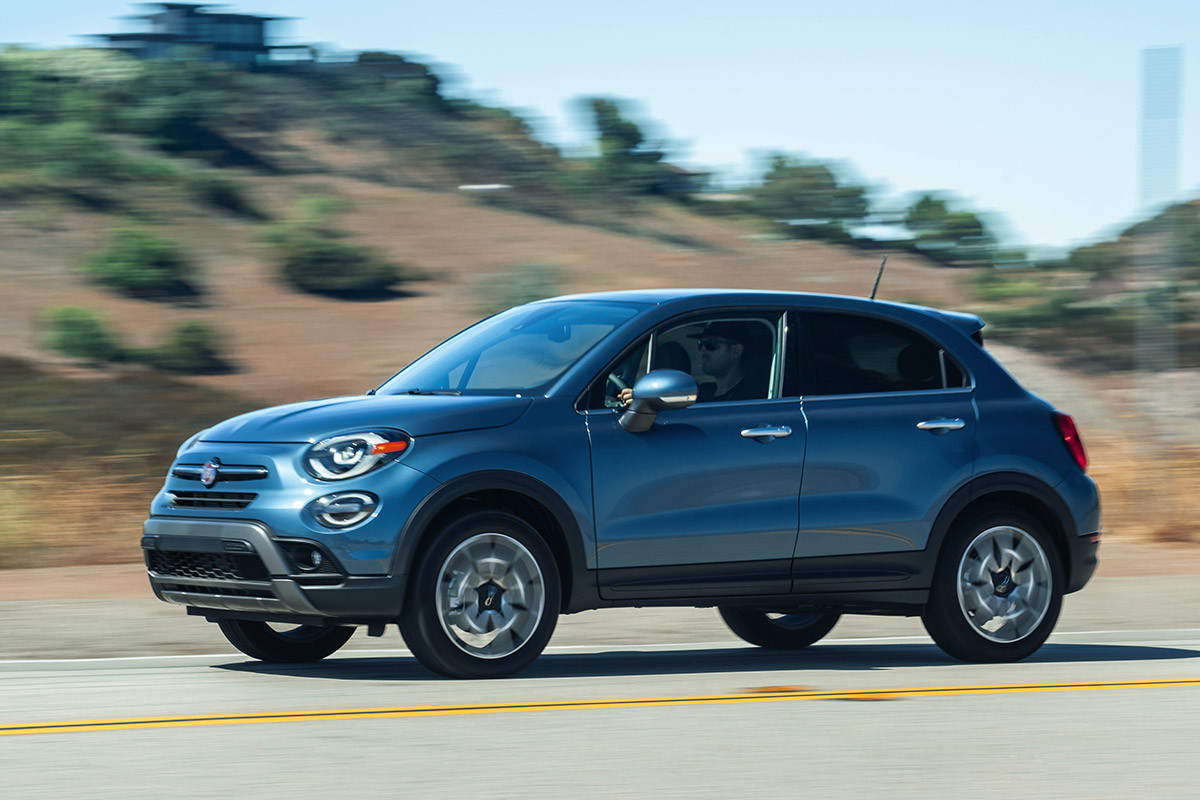 The Italia Blue 2020 Fiat 500X being driven on a road in suburban area