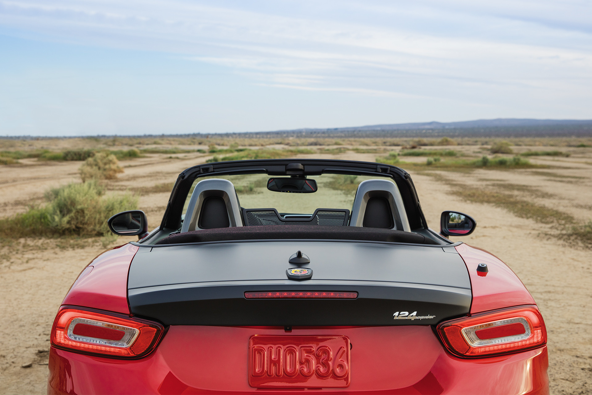 2019 Fiat 124 Spider rear exterior view, shown in red and black
