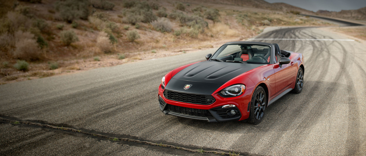 2019 124 Fiat Spider parked, shown in white