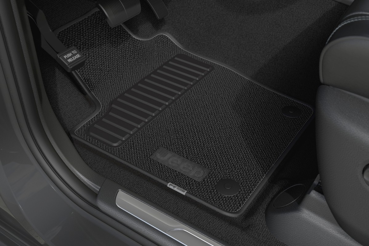 FLOOR MATS WITH LOGO Interior view of 2021 80th anniversary floormat with commemorative tags.