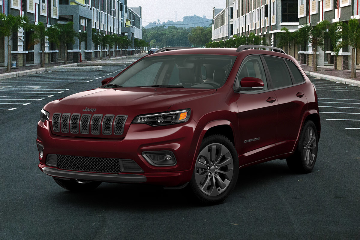 2020 Jeep Cherokee High Altitude exterior in red parked on city street.