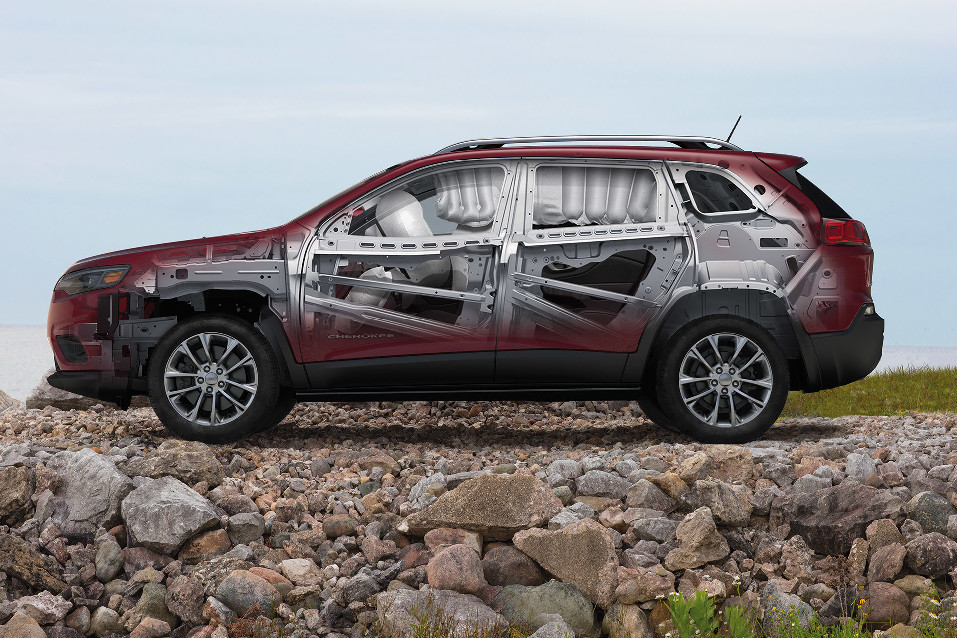 Side profile view of 2020 Jeep Cherokee highlighting its safety structure with under skin view