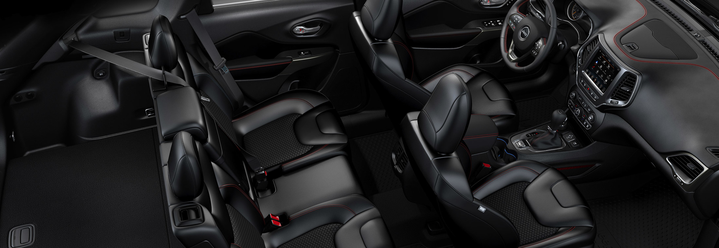 The interior or the 2021 Jeep Cherokee, shown with black Nappa leather-faced seats.