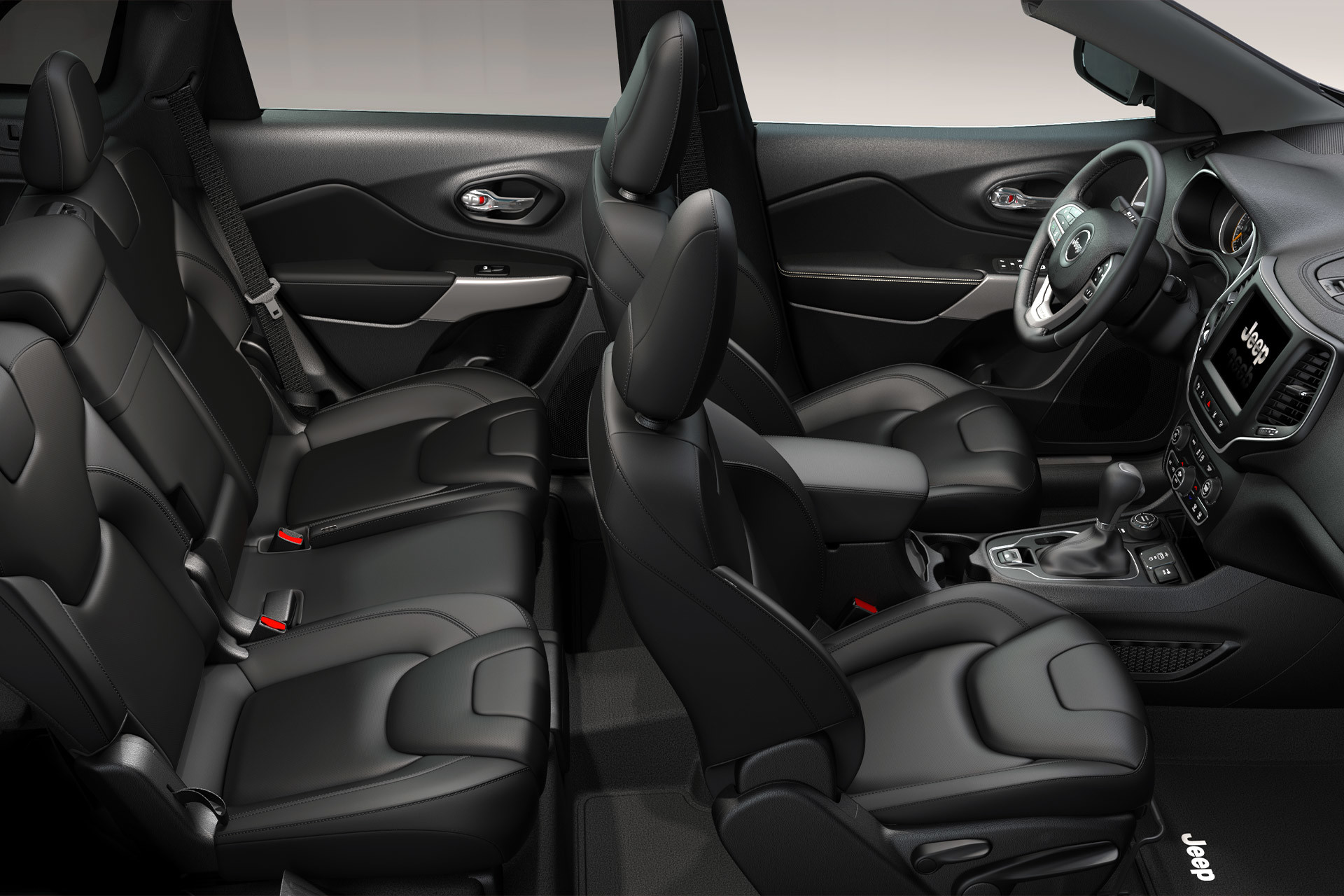 Intérieur du Cherokee Limited 2019 en noir avec sièges en position verticale.
