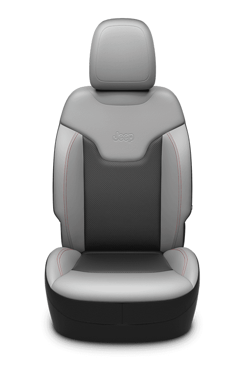 Leather‑faced seats with perforated inserts – Two‑tone Black/Ski Grey with Ruby Red accent stitching and embossed Jeep<sub>®</sub> logo