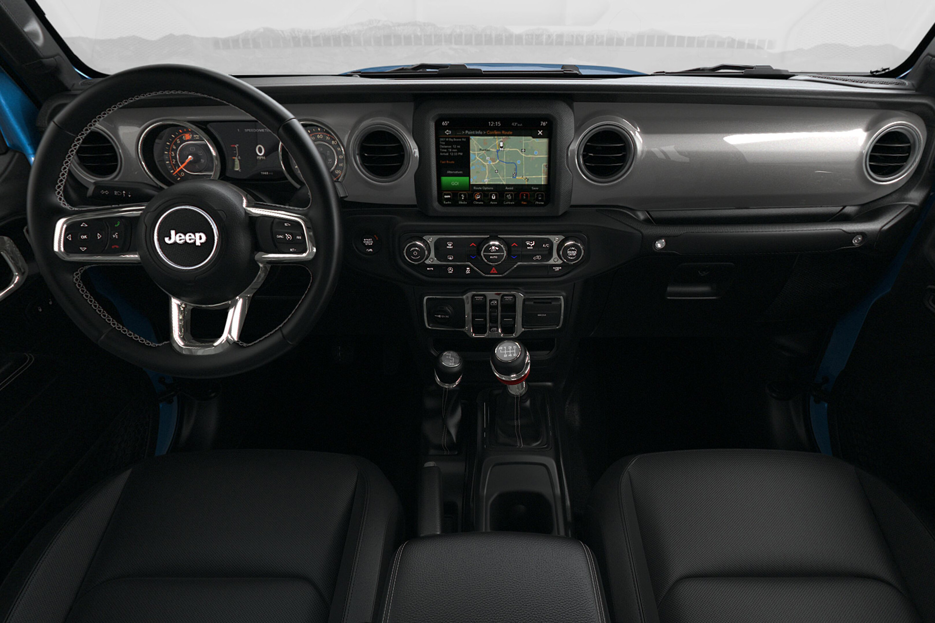 Interior view of the 2022 Jeep Gladiator, showing the driver and passenger seats, steering wheel and Uconnect touchscreen.